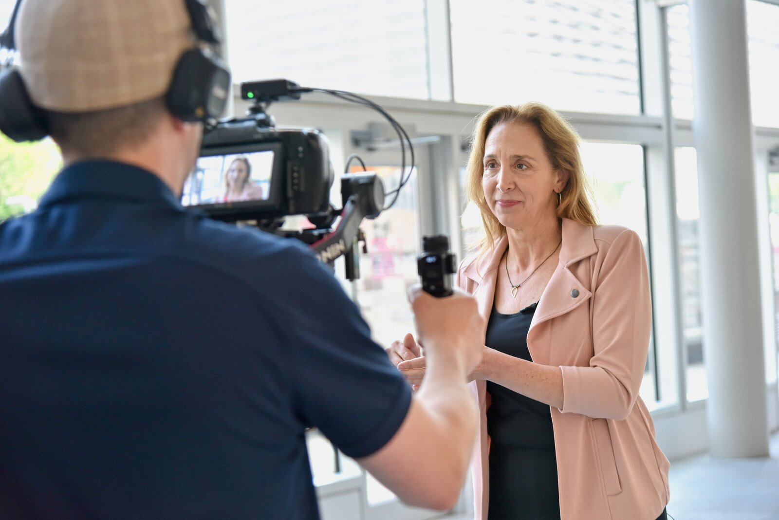 Close-up of a client being interviewed on camera